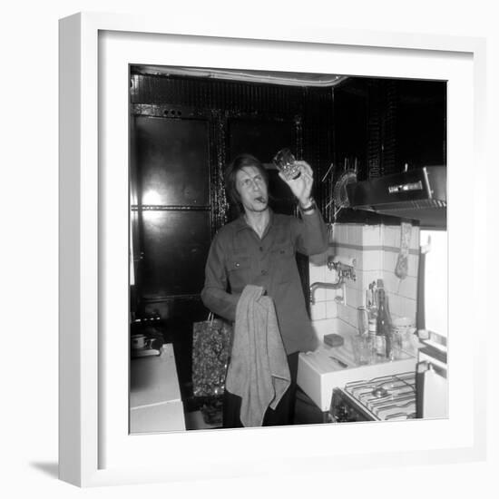 Jacques Dutronc Washing a Glass and Smoking a Cigar in 1972-Marcel Roldes-Framed Photographic Print