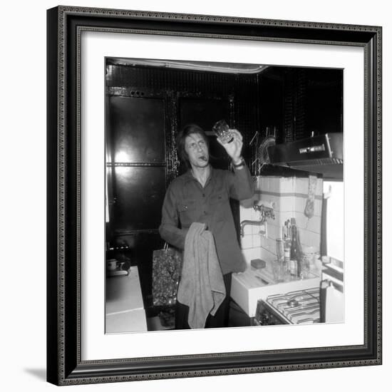 Jacques Dutronc Washing a Glass and Smoking a Cigar in 1972-Marcel Roldes-Framed Photographic Print