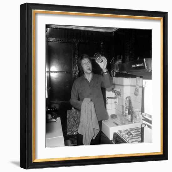 Jacques Dutronc Washing a Glass and Smoking a Cigar in 1972-Marcel Roldes-Framed Photographic Print