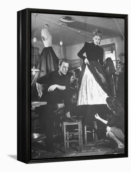 Jacques Fath Watching as the Tailor Hymns the Loose Ends at the Bottom of the Dress-Nina Leen-Framed Premier Image Canvas