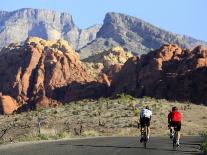Two Cyclists, Red Rock Canyon National Conservation Area, Nevada, May 6, 2006-Jae C. Hong-Premium Photographic Print