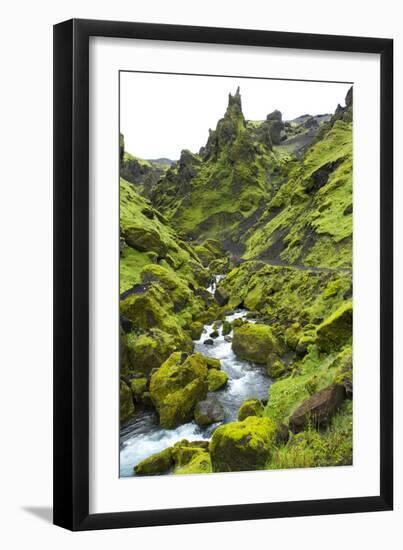 Jagged Moss Covered Peaks With A Mountain Stream Running Through With Hikers In The Distance-Erik Kruthoff-Framed Photographic Print