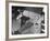 James Stewart Stretched Out on Office Sofa, Smiling, Producer Leland Hayward Slouches at Other End-John Florea-Framed Premium Photographic Print