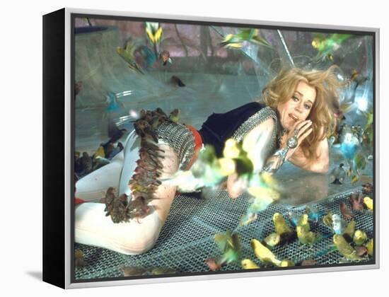 Jane Fonda is Preyed Upon by Parakeets and Finches in Scene from Roger Vadim's "Barbarella"-Carlo Bavagnoli-Framed Premier Image Canvas