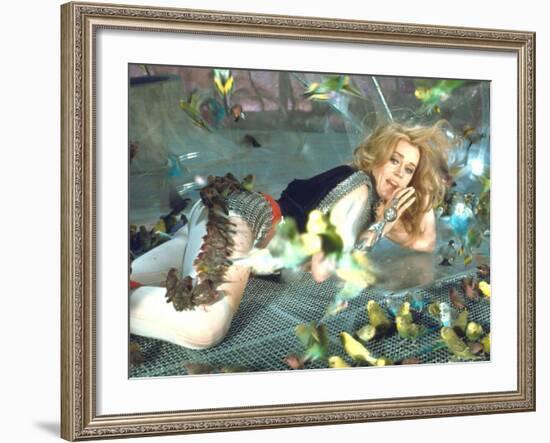 Jane Fonda is Preyed Upon by Parakeets and Finches in Scene from Roger Vadim's "Barbarella"-Carlo Bavagnoli-Framed Premium Photographic Print