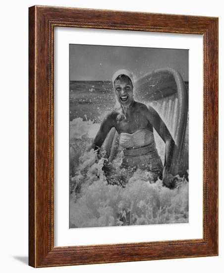 Janet Sims Playing in the Water on a Plastic Boat-George Silk-Framed Photographic Print