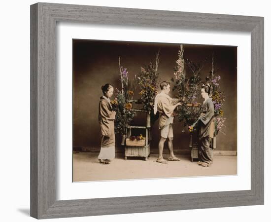 Japan, Japanese Women and Man Flower Arranging-null-Framed Giclee Print