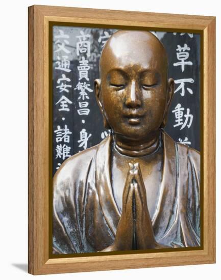 Japan, Tokyo, Asakusa, Asakusa Kannon Temple, Preying Buddha Statue-Steve Vidler-Framed Premier Image Canvas