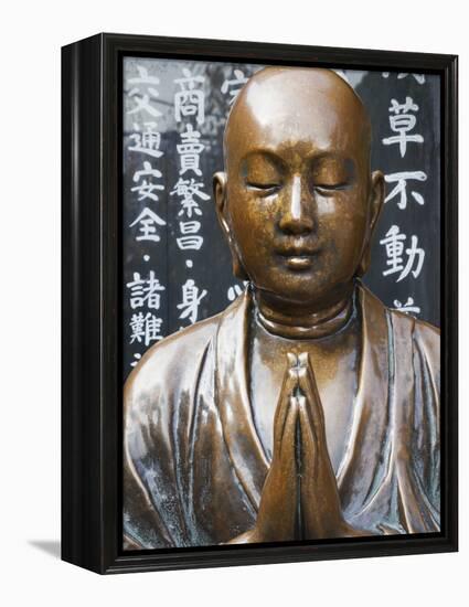 Japan, Tokyo, Asakusa, Asakusa Kannon Temple, Preying Buddha Statue-Steve Vidler-Framed Premier Image Canvas
