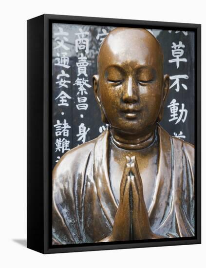 Japan, Tokyo, Asakusa, Asakusa Kannon Temple, Preying Buddha Statue-Steve Vidler-Framed Premier Image Canvas