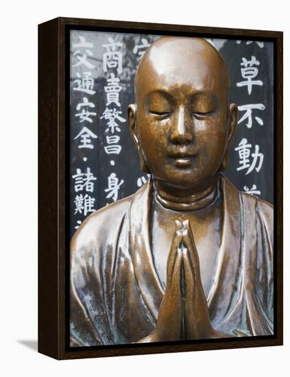 Japan, Tokyo, Asakusa, Asakusa Kannon Temple, Preying Buddha Statue-Steve Vidler-Framed Premier Image Canvas