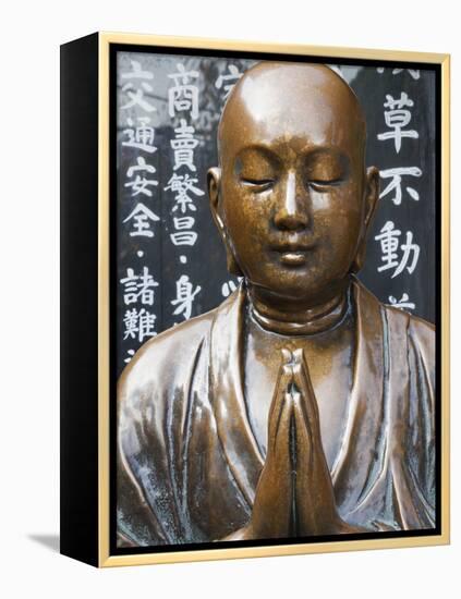 Japan, Tokyo, Asakusa, Asakusa Kannon Temple, Preying Buddha Statue-Steve Vidler-Framed Premier Image Canvas