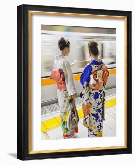 Japan, Tokyo, Girls in Kimono on Subway Platform-Steve Vidler-Framed Photographic Print