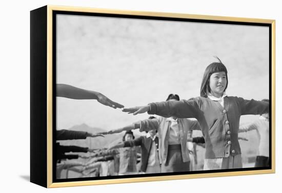 Japanese-American girls exercising at Manzanar, 1943-Ansel Adams-Framed Premier Image Canvas