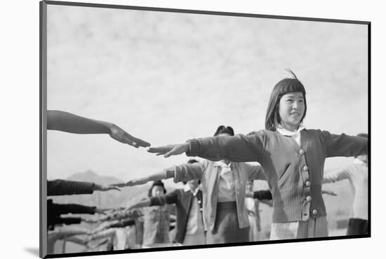 Japanese-American girls exercising at Manzanar, 1943-Ansel Adams-Mounted Photographic Print