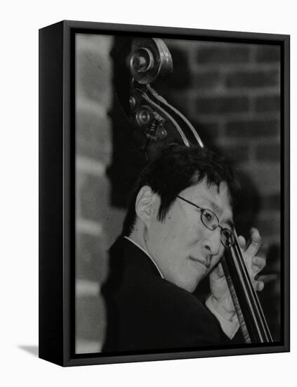 Japanese Bassist Kengo Nakamura Playing at the Fairway, Welwyn Garden City, Hertfordshire, 2004-Denis Williams-Framed Premier Image Canvas