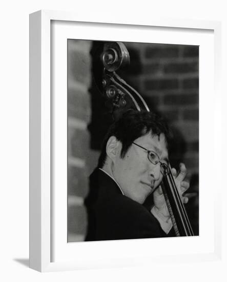 Japanese Bassist Kengo Nakamura Playing at the Fairway, Welwyn Garden City, Hertfordshire, 2004-Denis Williams-Framed Photographic Print