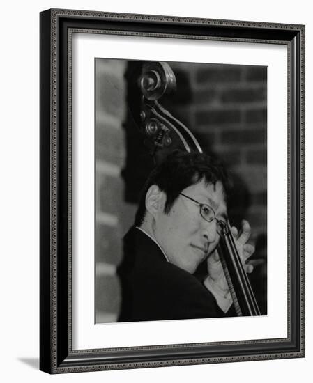 Japanese Bassist Kengo Nakamura Playing at the Fairway, Welwyn Garden City, Hertfordshire, 2004-Denis Williams-Framed Photographic Print