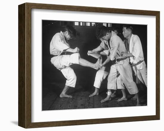 Japanese Karate Student Breaking Boards with Kick-John Florea-Framed Photographic Print