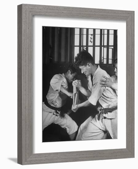 Japanese Karate Student Breaking Boards with Punch-John Florea-Framed Photographic Print