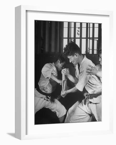 Japanese Karate Student Breaking Boards with Punch-John Florea-Framed Photographic Print