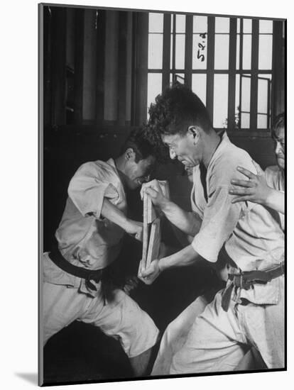 Japanese Karate Student Breaking Boards with Punch-John Florea-Mounted Photographic Print