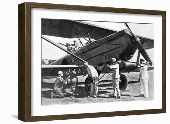 Japanese Plane Being Loaded with Bombs in Manchuria, 1933-Japanese Photographer-Framed Photographic Print