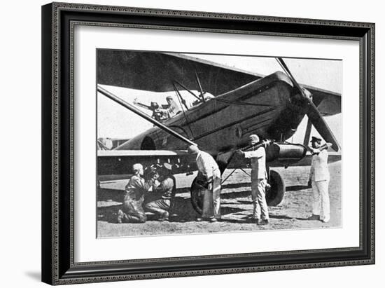 Japanese Plane Being Loaded with Bombs in Manchuria, 1933-Japanese Photographer-Framed Photographic Print