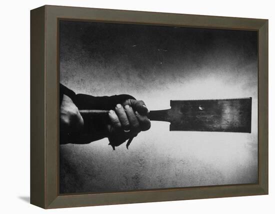 Japanese Saw Held by Furniture Maker George Nakashima-John Loengard-Framed Premier Image Canvas