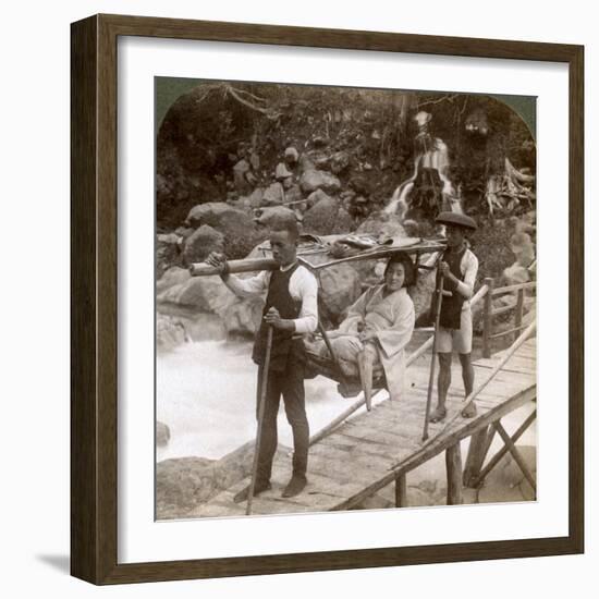 Japanese Woman in a Yamakago (Mountain Chai) Crossing the Torrential Daiya River Near Nikko, Japan-Underwood & Underwood-Framed Photographic Print