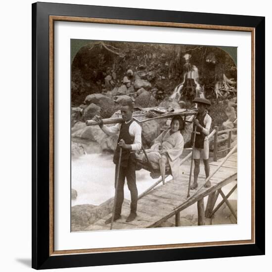 Japanese Woman in a Yamakago (Mountain Chai) Crossing the Torrential Daiya River Near Nikko, Japan-Underwood & Underwood-Framed Photographic Print