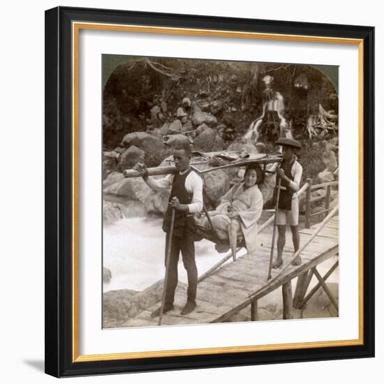 Japanese Woman in a Yamakago (Mountain Chai) Crossing the Torrential Daiya River Near Nikko, Japan-Underwood & Underwood-Framed Photographic Print