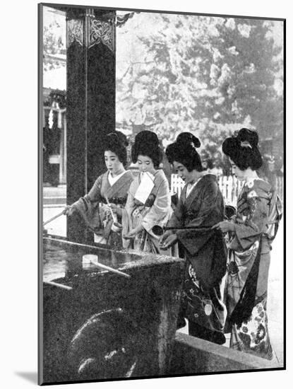 Japanese Women Washing their Hands Prior to Entering a Temple, 1936-Sport & General-Mounted Giclee Print