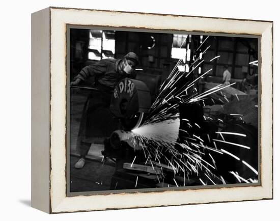 Japanese Worker Cutting Steel Pipe W. Huge Power Saw at Yawata Steel Mill-Margaret Bourke-White-Framed Premier Image Canvas