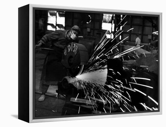 Japanese Worker Cutting Steel Pipe W. Huge Power Saw at Yawata Steel Mill-Margaret Bourke-White-Framed Premier Image Canvas