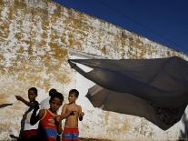 A Group of Children Fly Plastic Bags, Known as Papalotes-Javier Galeano-Photographic Print