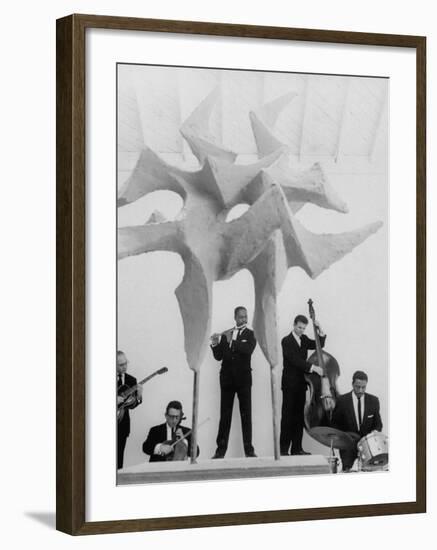 Jazz Drummer Chico Hamilton Playing with Band Behind Sculpture Called "Counterpoints"-Gordon Parks-Framed Premium Photographic Print