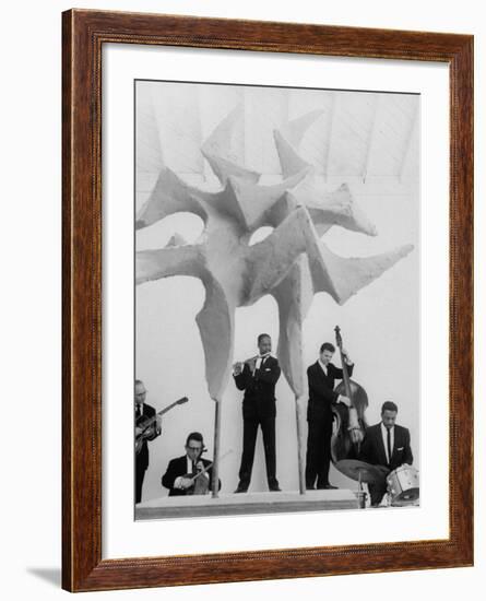 Jazz Drummer Chico Hamilton Playing with Band Behind Sculpture Called "Counterpoints"-Gordon Parks-Framed Premium Photographic Print