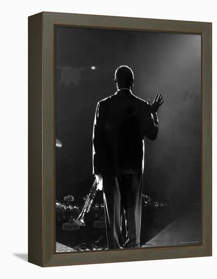 Jazz Trumpeter Louis Armstrong Waving to a Crowd of Adoring Fans as Their Applause Rolls over Him-John Loengard-Framed Premier Image Canvas