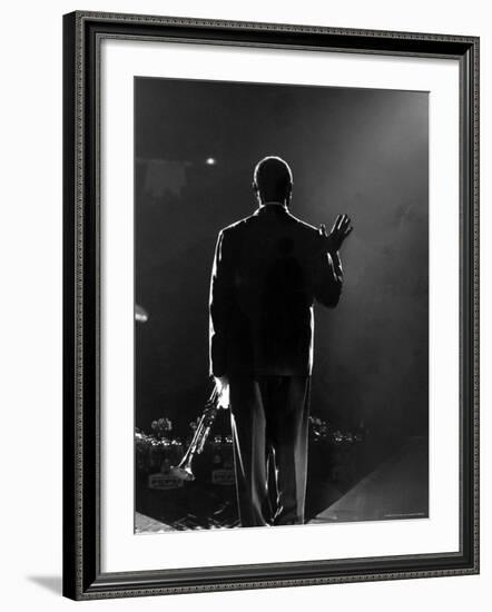 Jazz Trumpeter Louis Armstrong Waving to a Crowd of Adoring Fans as Their Applause Rolls over Him-John Loengard-Framed Premium Photographic Print