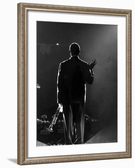 Jazz Trumpeter Louis Armstrong Waving to a Crowd of Adoring Fans as Their Applause Rolls over Him-John Loengard-Framed Premium Photographic Print