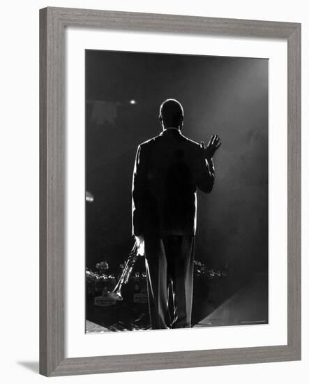 Jazz Trumpeter Louis Armstrong Waving to a Crowd of Adoring Fans as Their Applause Rolls over Him-John Loengard-Framed Premium Photographic Print