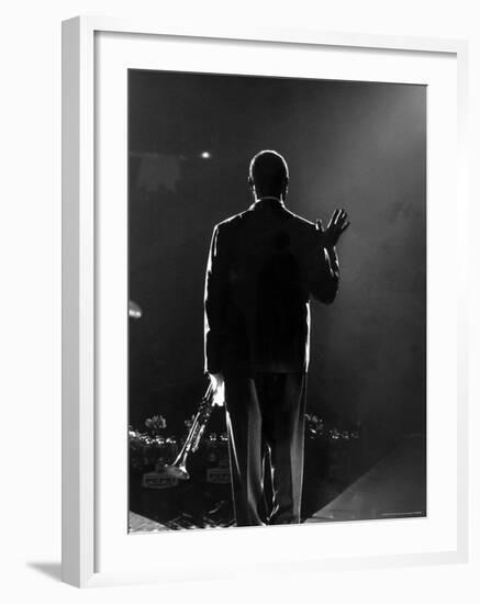 Jazz Trumpeter Louis Armstrong Waving to a Crowd of Adoring Fans as Their Applause Rolls over Him-John Loengard-Framed Premium Photographic Print