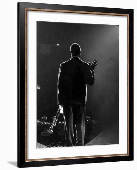 Jazz Trumpeter Louis Armstrong Waving to a Crowd of Adoring Fans as Their Applause Rolls over Him-John Loengard-Framed Premium Photographic Print