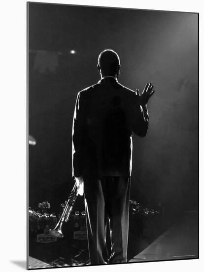 Jazz Trumpeter Louis Armstrong Waving to a Crowd of Adoring Fans as Their Applause Rolls over Him-John Loengard-Mounted Premium Photographic Print