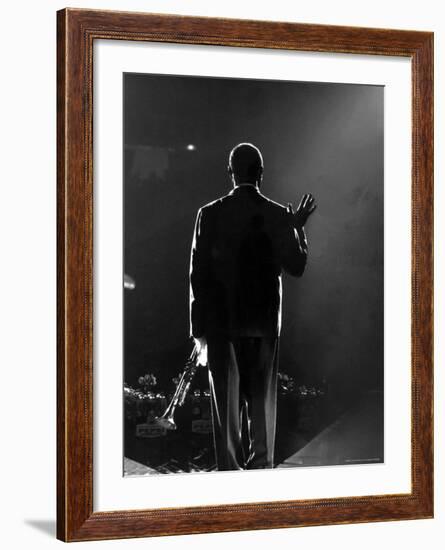 Jazz Trumpeter Louis Armstrong Waving to a Crowd of Adoring Fans as Their Applause Rolls over Him-John Loengard-Framed Premium Photographic Print