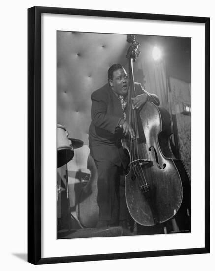 Jazzman Playing a Bass in a Club-Peter Stackpole-Framed Photographic Print