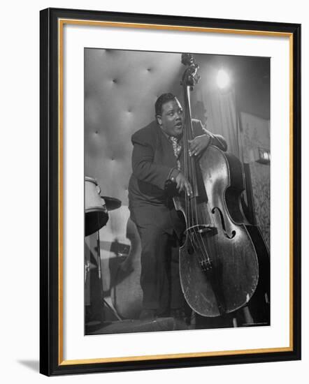 Jazzman Playing a Bass in a Club-Peter Stackpole-Framed Photographic Print