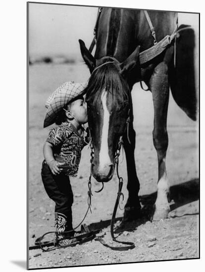 Jean Anne Evans, 14 Month Old Texas Girl Kissing Her Horse-Allan Grant-Mounted Premium Photographic Print