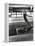 Jean Babilee, Star of Ballets Des Champs Elysees, Leaping During Practice as Other Dancers Watch-Gjon Mili-Framed Premier Image Canvas